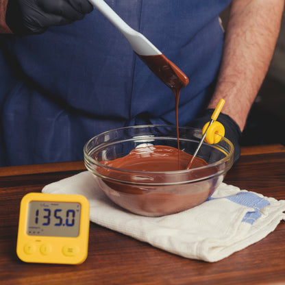 Using the Combustion Pot Clip with the Predictive Thermometer while tempering chocolate.