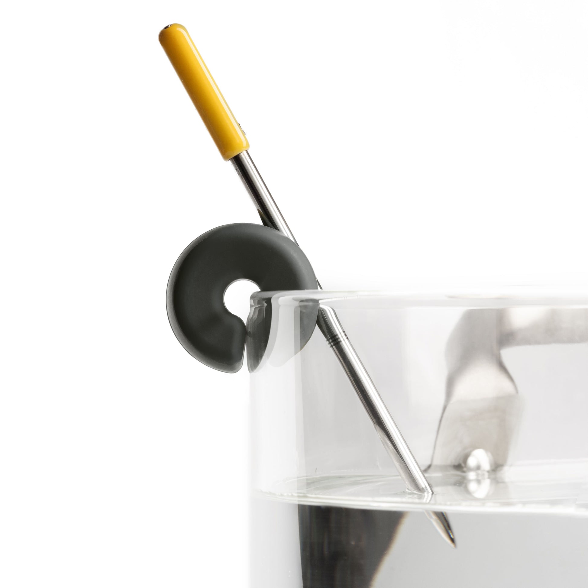 Combustion Pot Clip (black) holding a Predictive Thermometer on the edge of a transparent glass pot.